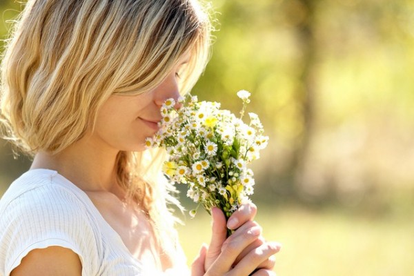 smelling-flowers