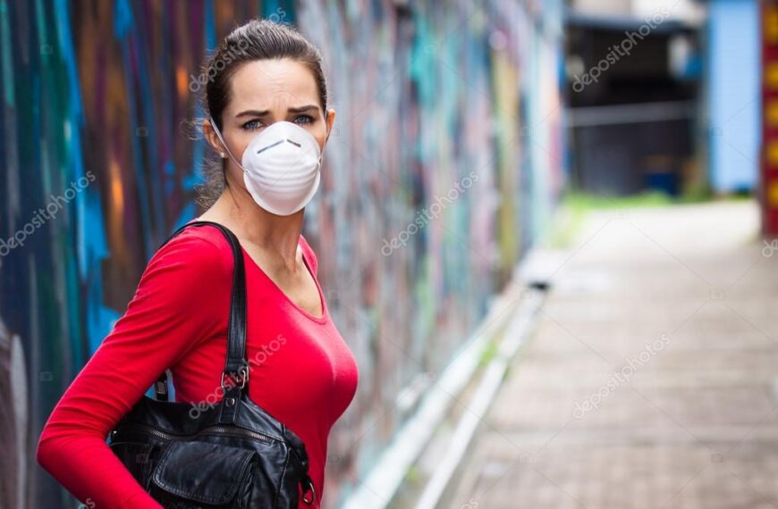 Unhappy woman wearing face mask