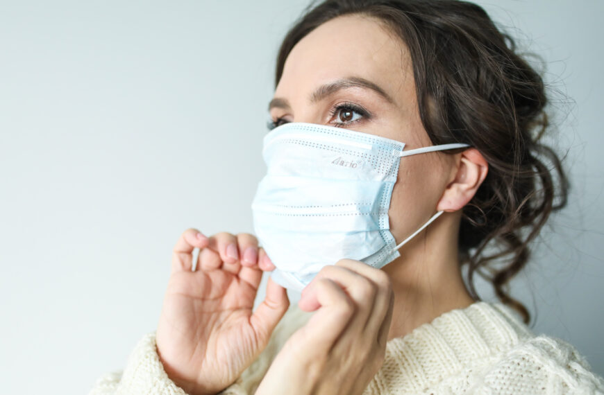 Woman in white face mask
