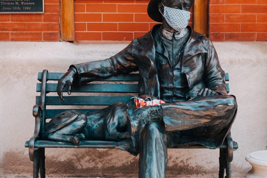 Masks were left on a statue of a fireman and his dog in Milwaukee's Third Ward. These are amongst several displays of solidarity during Covid-19.