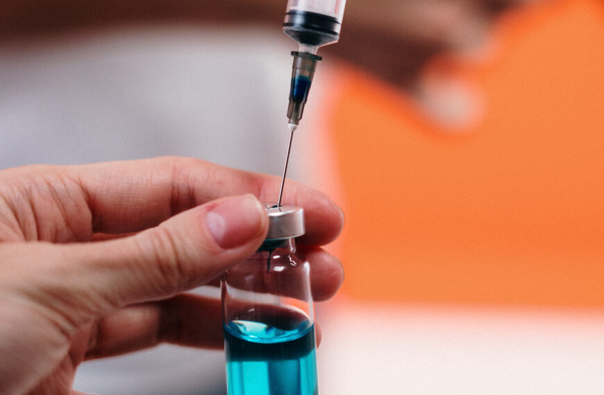 Person holding a vaccine