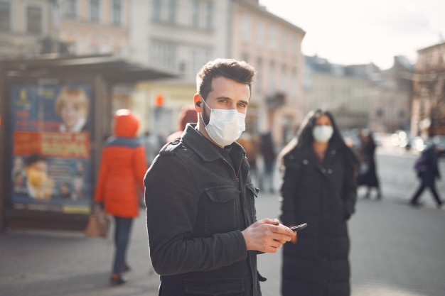 people-wearing-protective-mask-standing-street